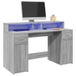 Scrivania con Luci LED Grigio Sonoma 140x55x91cm in Multistrato