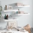 Scaffali a Parete 4 pz Bianco Lucido 50x23x3,8 cm in MDF